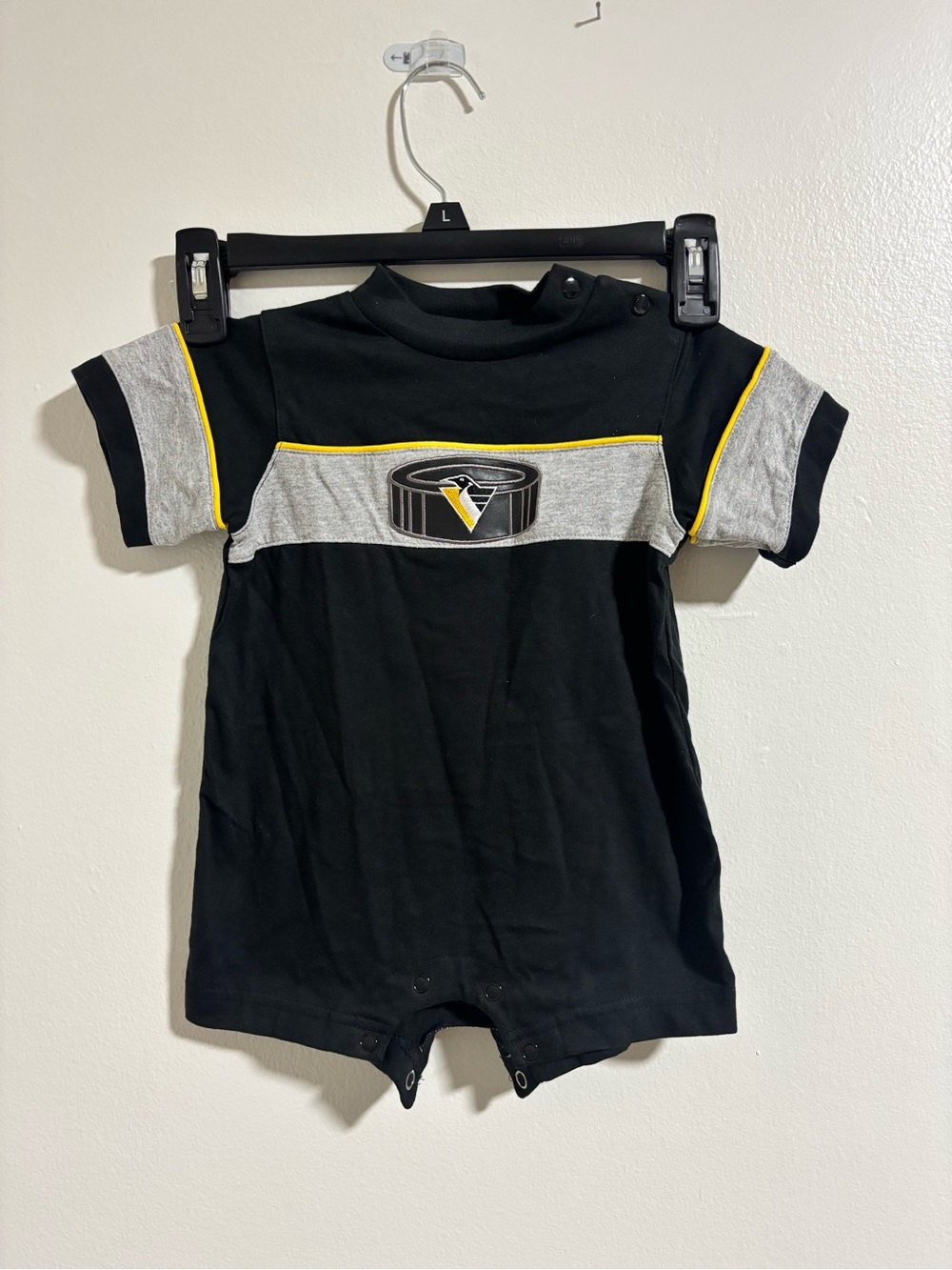 NHL Black One-Piece Romper with Gray Panels and Yellow Piping